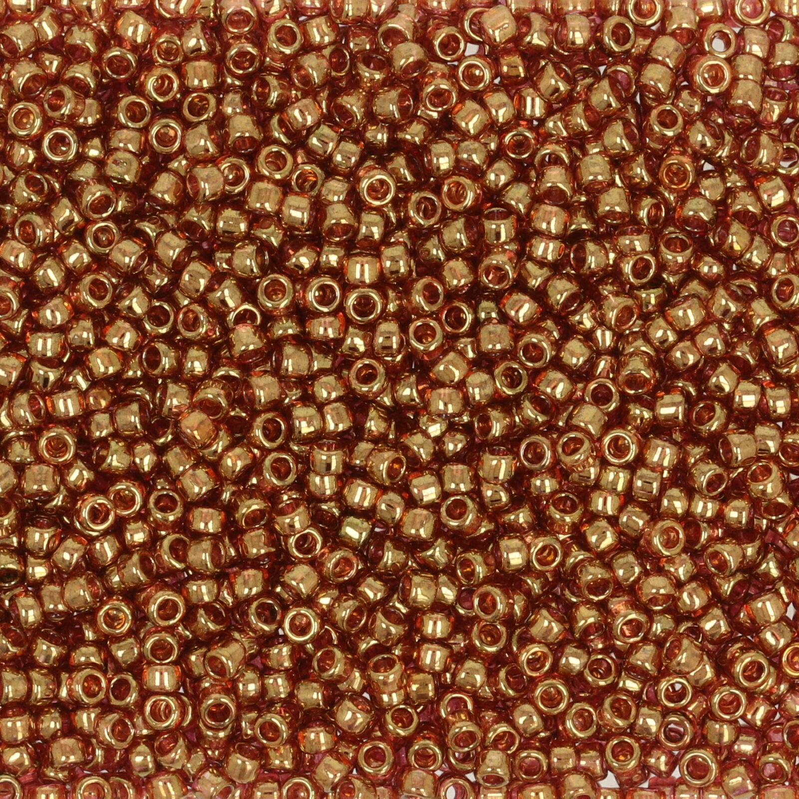 saatperlen toho 15/0 gold lustered transparent pink (421) | 10gr