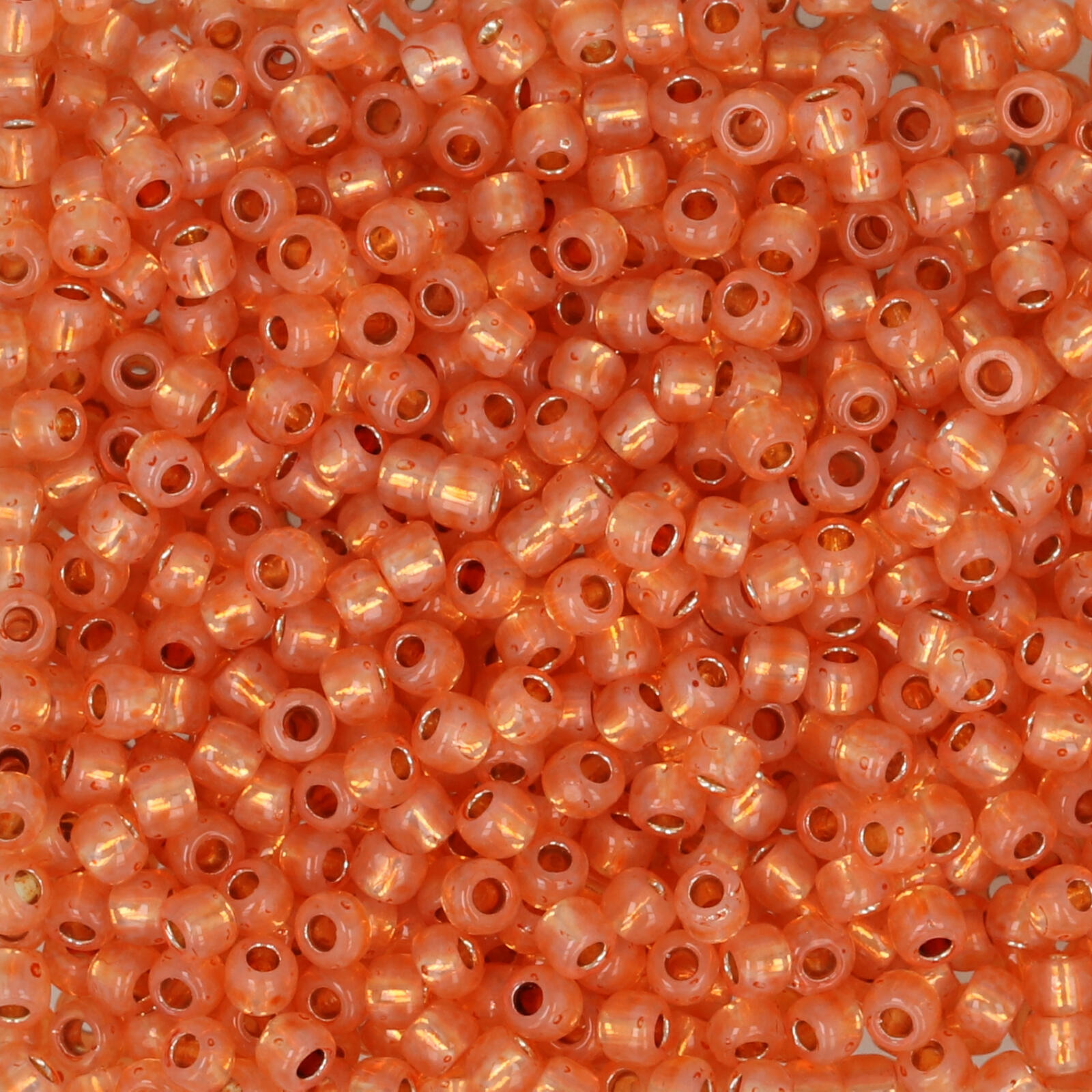 saatperlen toho 11/0 per.finish silver-lined milky grapefruit (pf2112) | 10gr