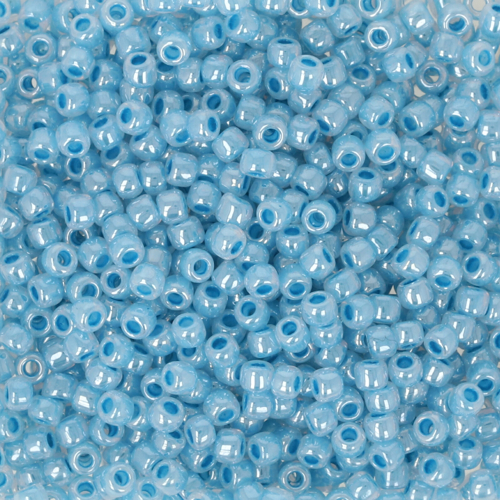 rocaille toho seed beads 11/0 transparent rainbow ruby (165c) | 10gr