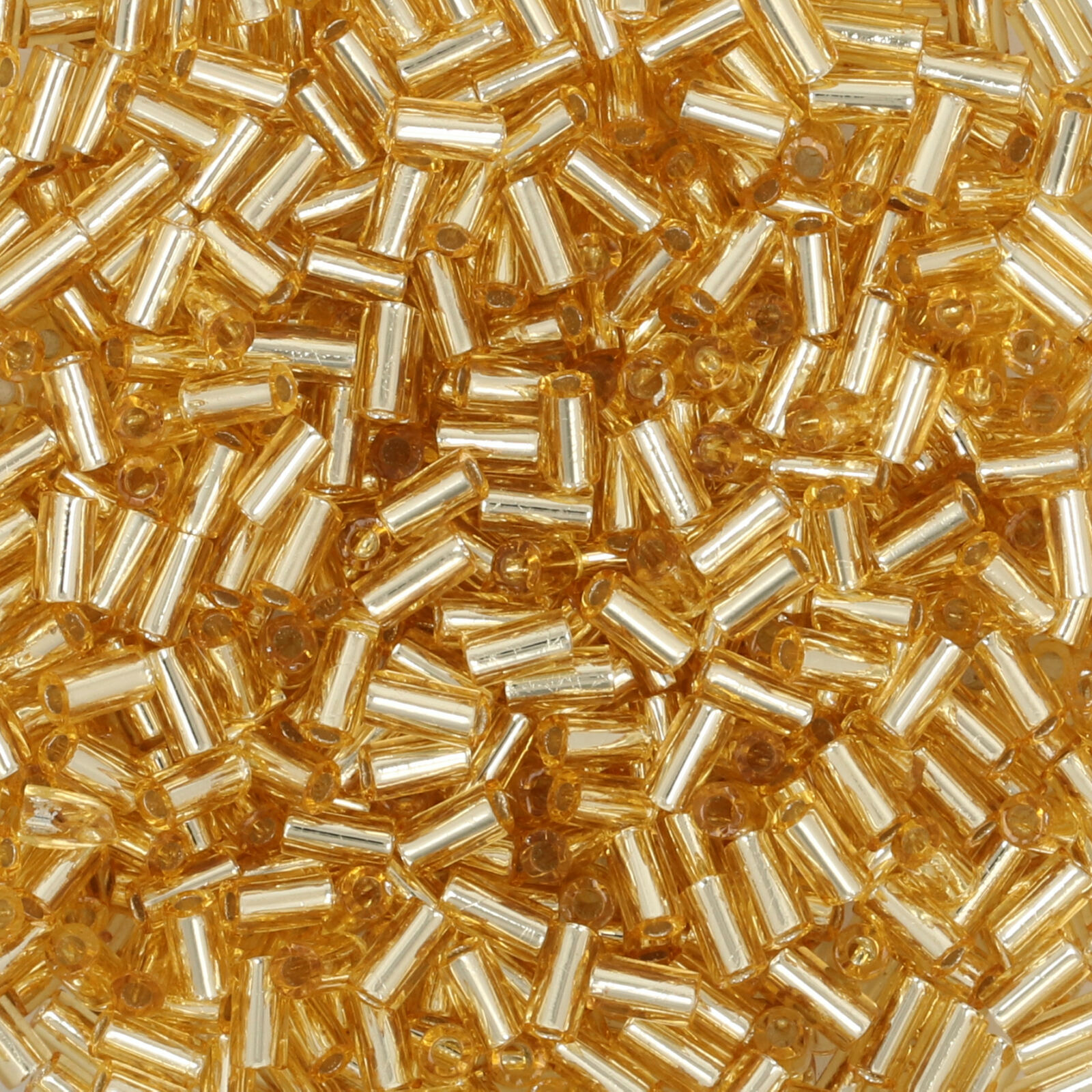 bugle toho beads 3mm - silver-lined light topaz (22) | 10gr