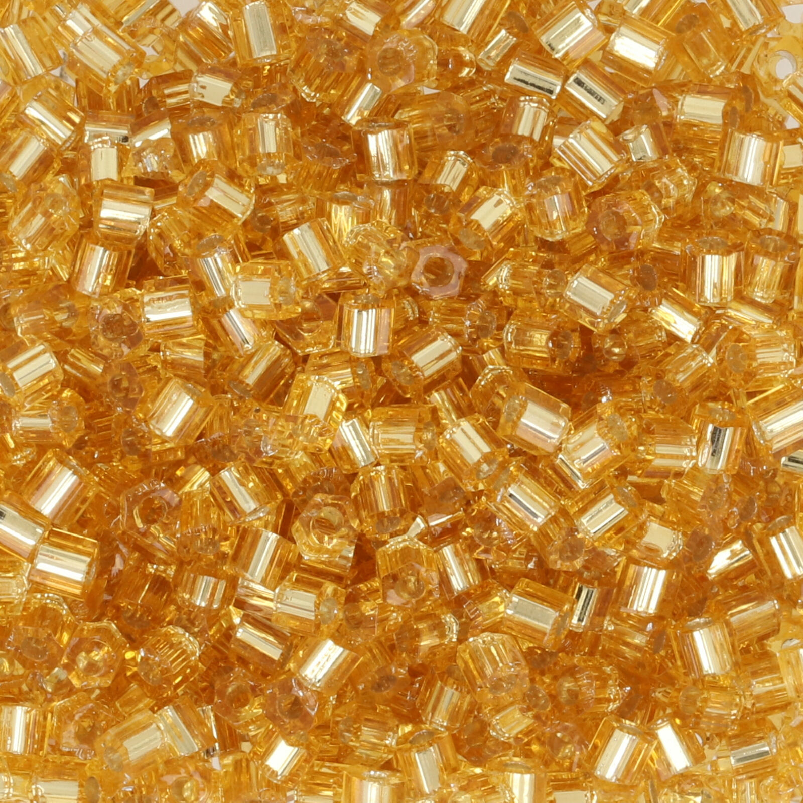 hexagon toho seed beads 11/0 - silver-lined topaz (22) | 10gr