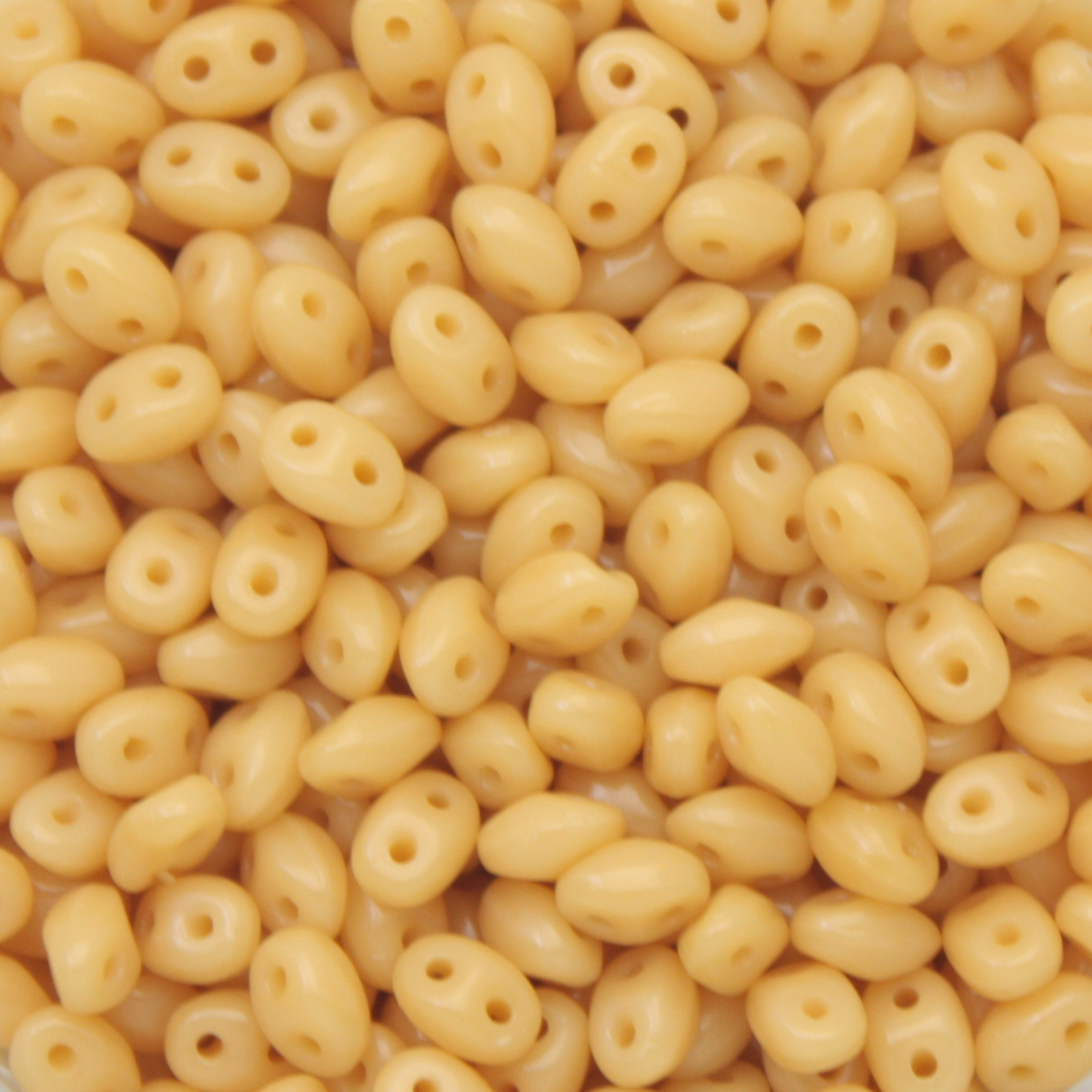 pressed twin beads opaque ivory 5x2,5mm | 20gr