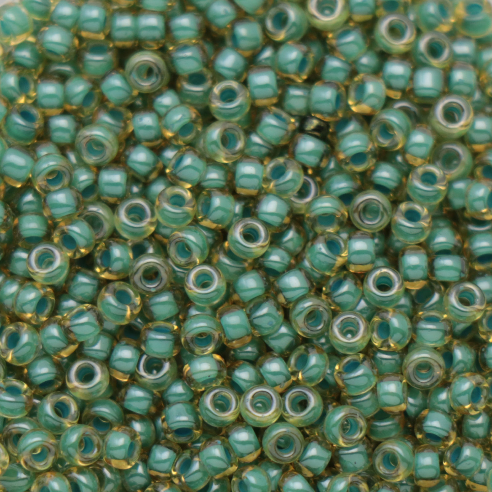 miyuki rocailles 11/0 - color-lined turquoise/light topaz luster (374) | 10gr