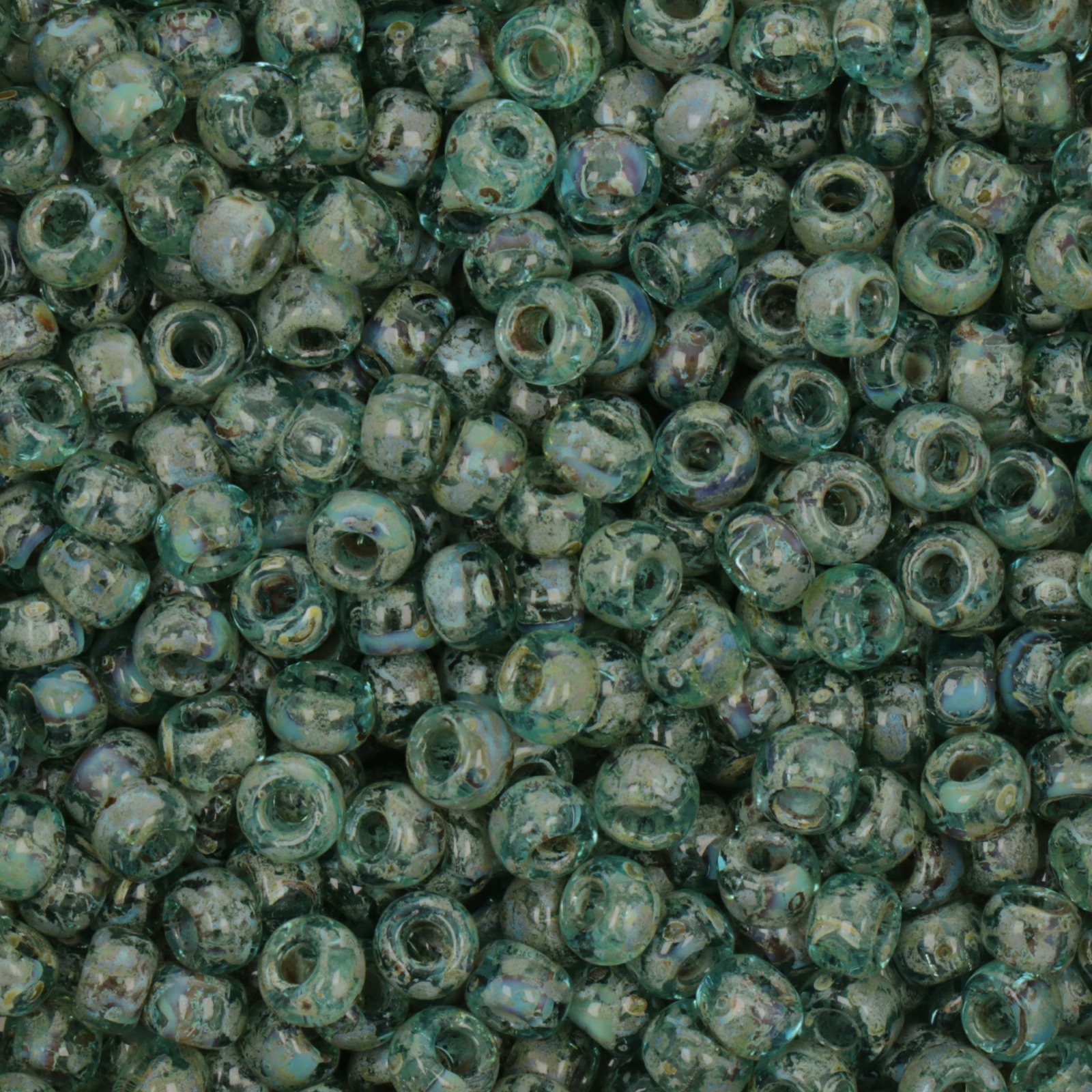 miyuki rocailles 6/0 - picasso transparent olivine (4506) | 10gr
